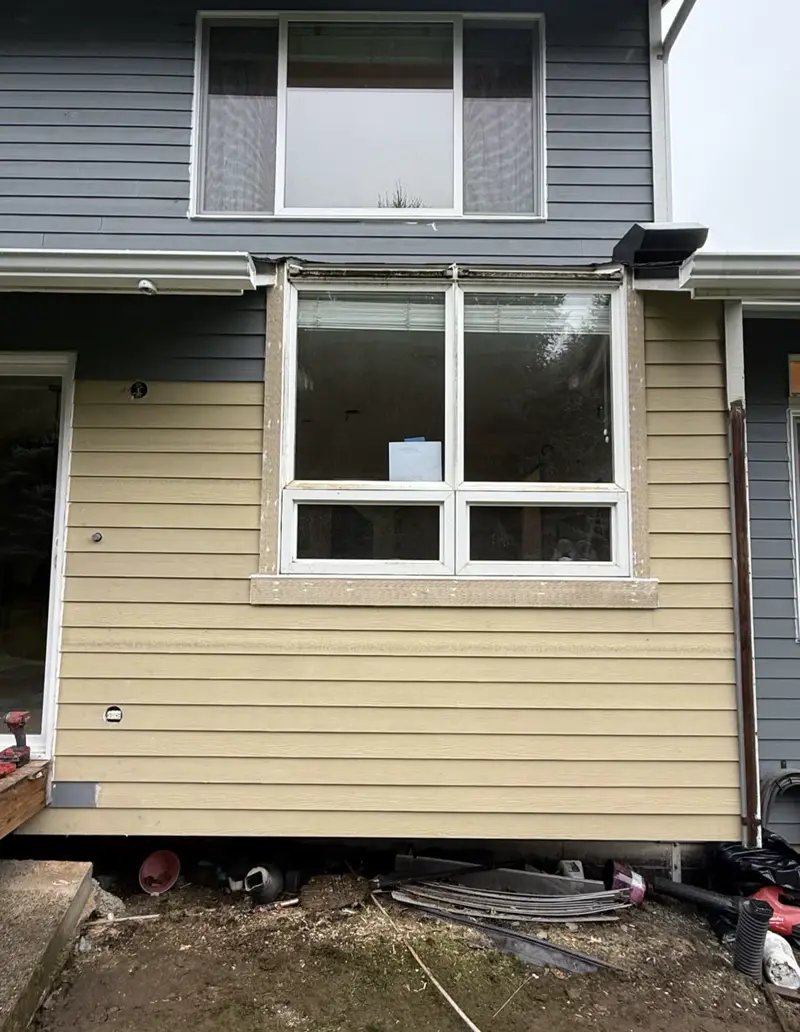 After: New siding and trim around the window