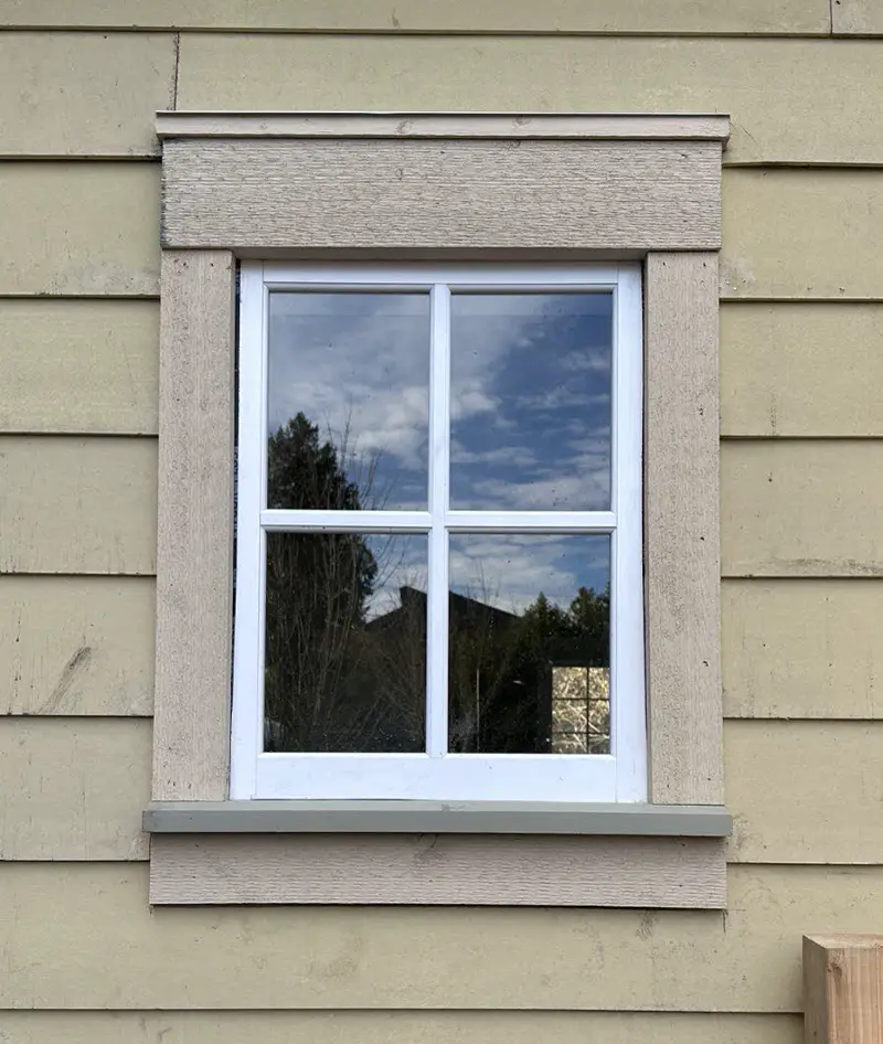 Window trim with head flashing